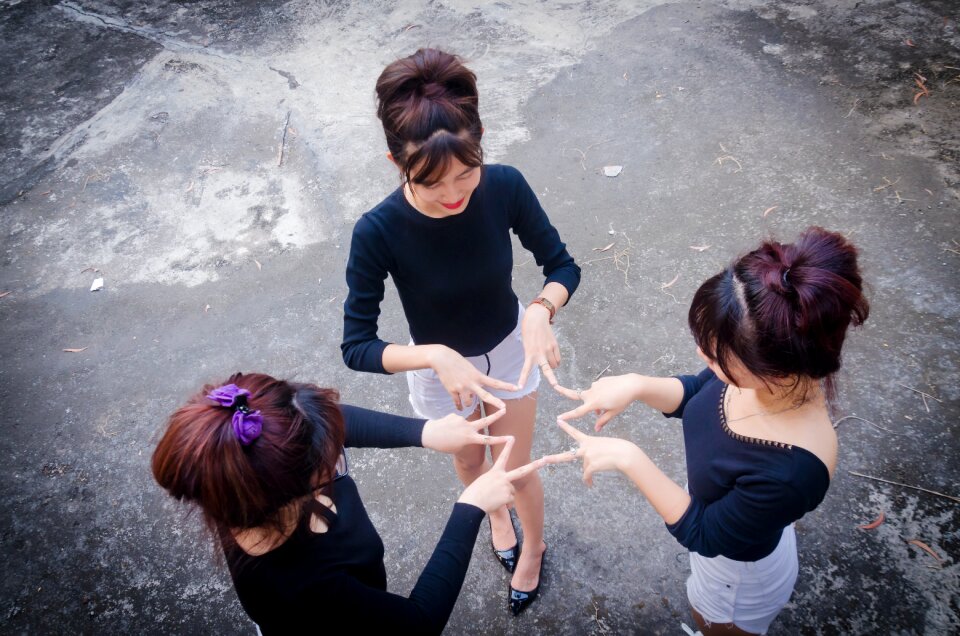 Young hands together