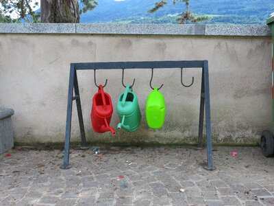 Watering cans cemetery care photo