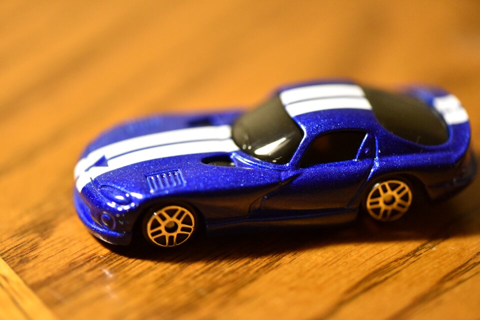 Blue bokeh orange car