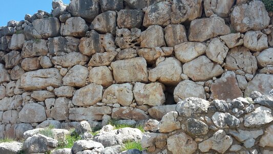 Wall old natural stone wall
