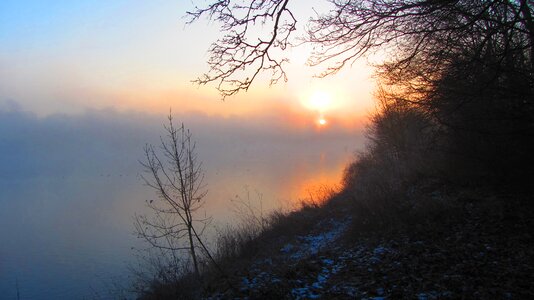 Autumn fog sunbeam photo