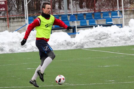 Footballer a man winter photo