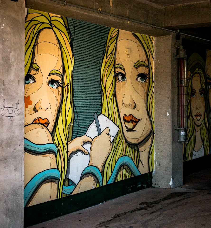 Woman painting mural