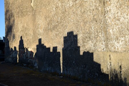 Cemetery shadow wall photo