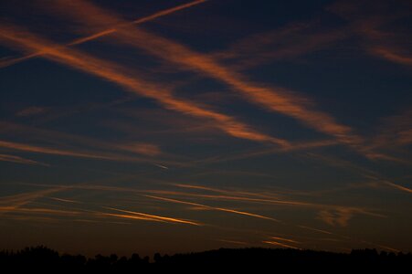 Contrail sunset flying photo