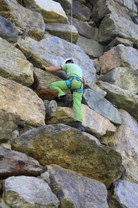 Climber climbing wall mountaineering photo