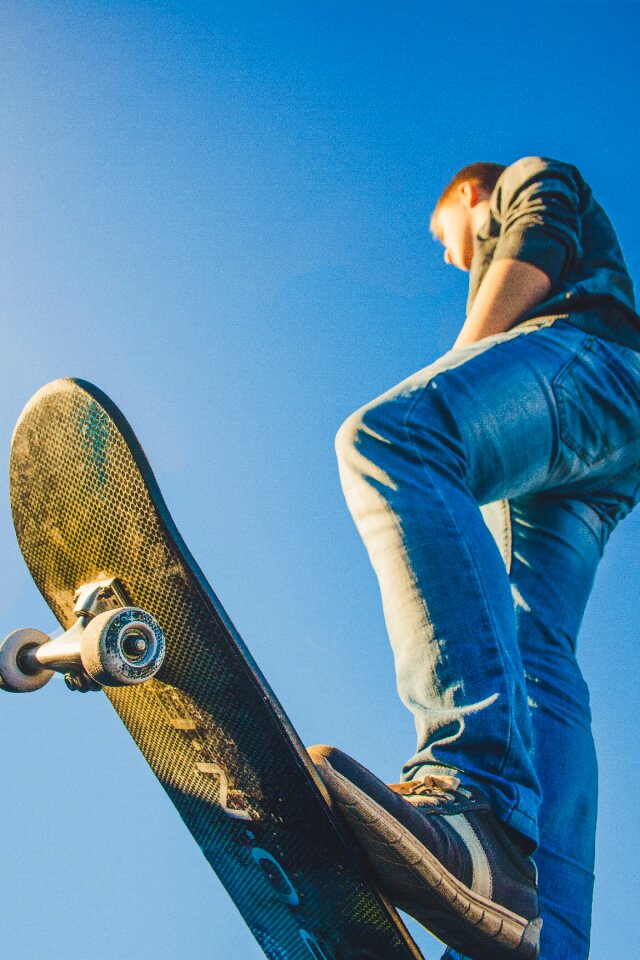 Sky man skateboarder