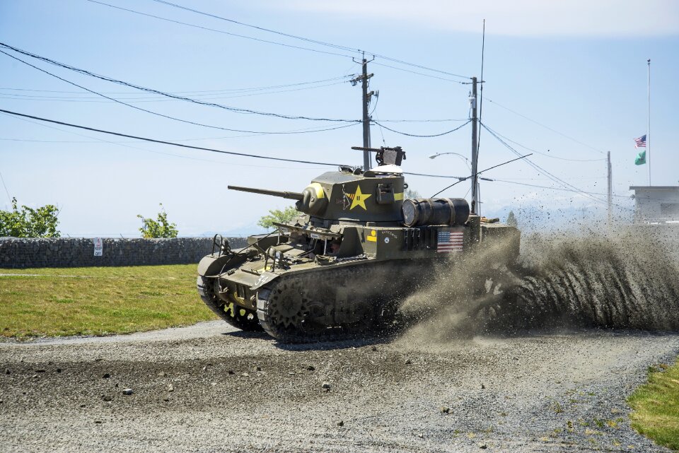 M3a1 stuart tank under way gravel spray