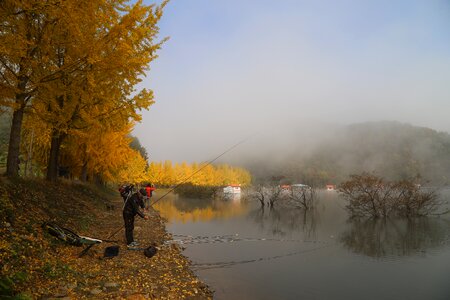 Fishing morning water mist photo
