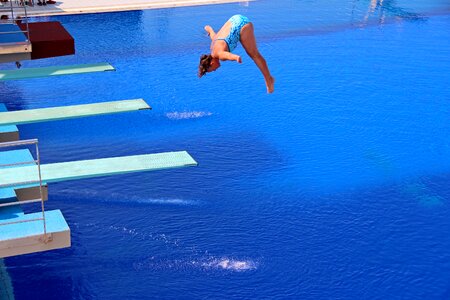 Jumping into water water pool photo