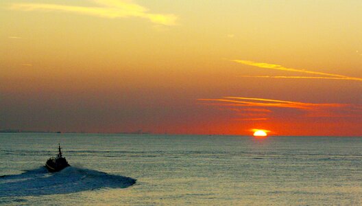 Ship sea clouds photo