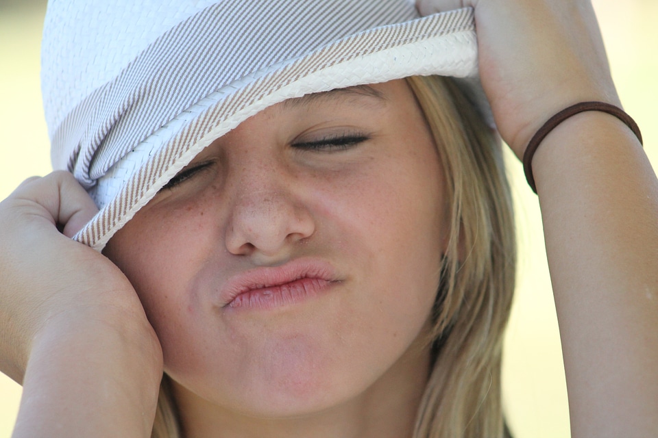 Hat close-up making a face