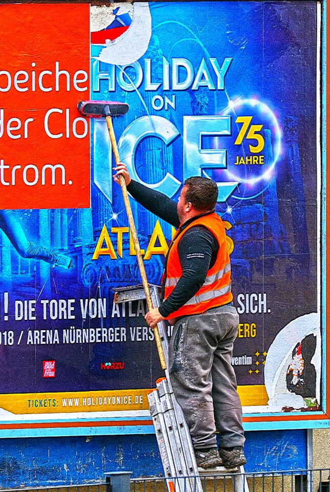 Man advertising board work