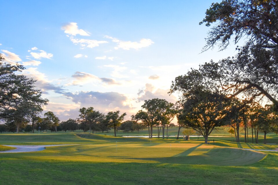 Golfer golfing outdoors