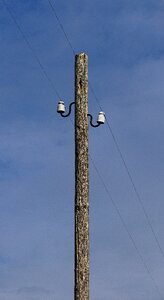 Mast aboveground the telephone line photo