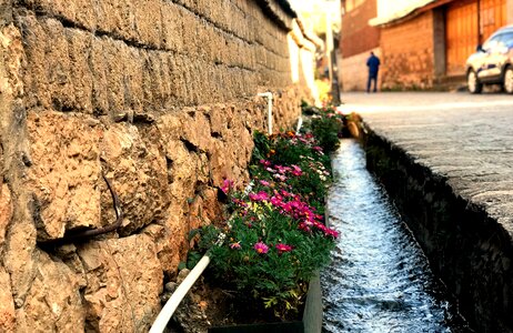 The ancient town flowers running water