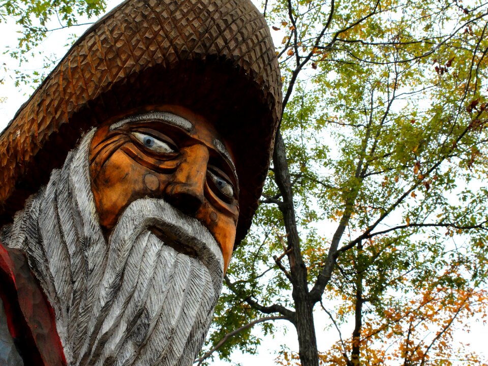 Wooden sculpture fisherman nature