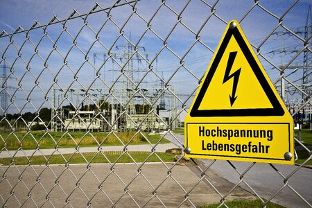 Street sign high voltage wire mesh fence