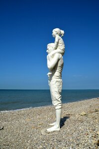 Beach sculpture sky