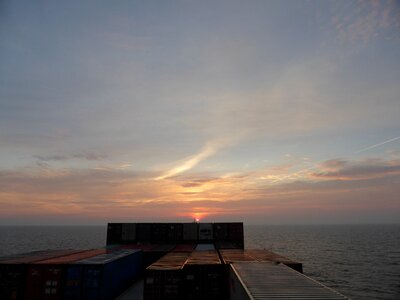 Container sea sunrise photo