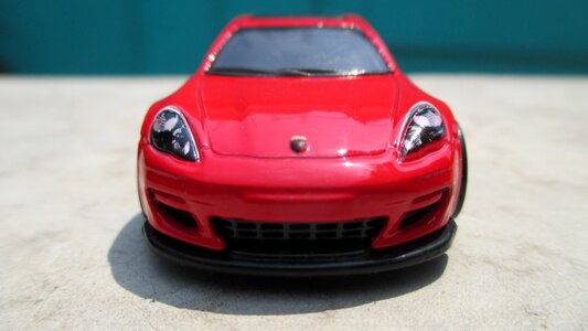 Porche red toy car photo