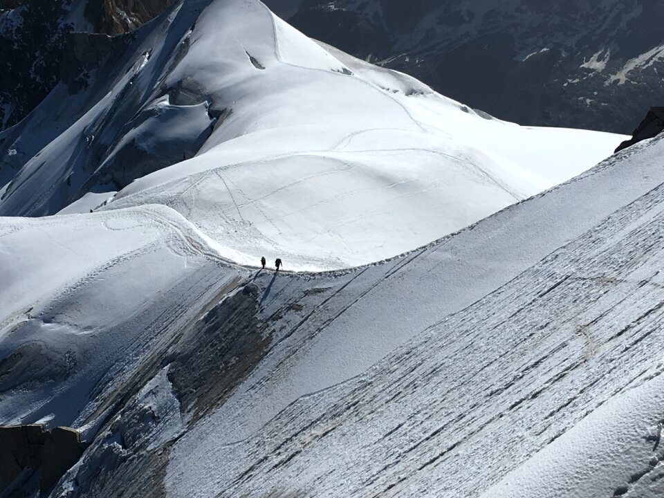 The climbers on the glacier in summer Alps, Chamonix France