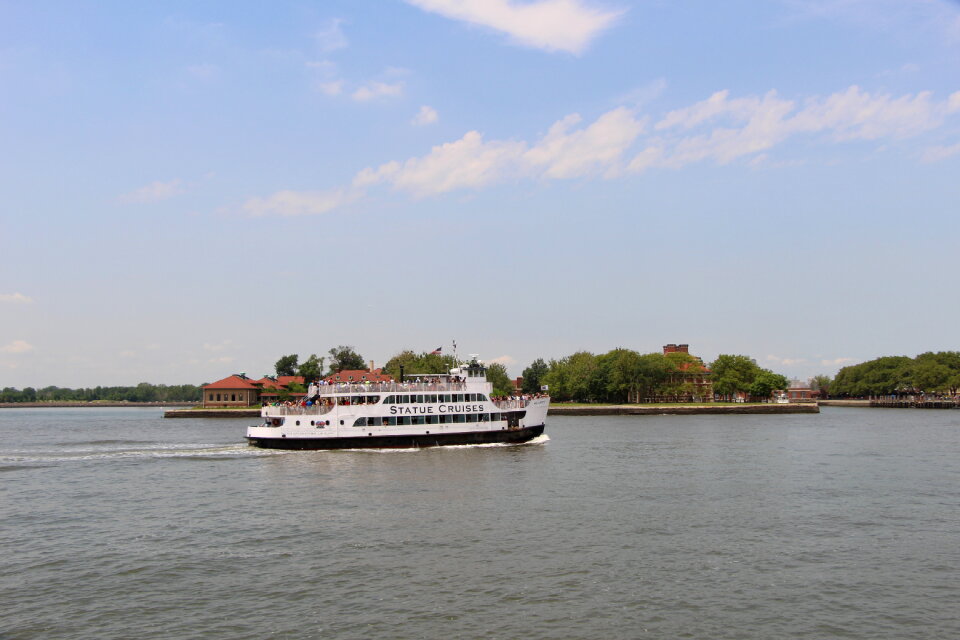 Statue of Liberty, cruise boat, New York City photo