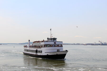 Statue of Liberty, cruise boat, New York City photo