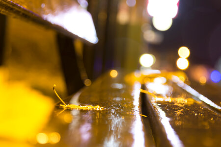 night, autumn bench city, blurred autumn background photo