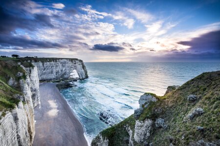 Etretat Aval cliff, rocks, natural arch landmark and blue ocean