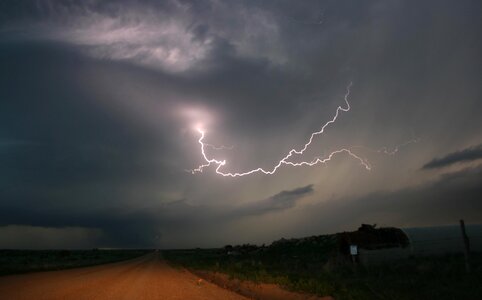 Heavy clouds bringing thunder, lightnings and storm photo