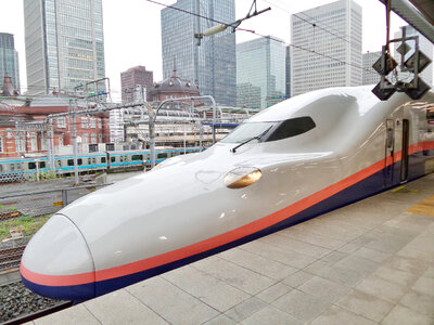 Shinkansen Hayabusa train and other in Tokyo Station, Japan photo