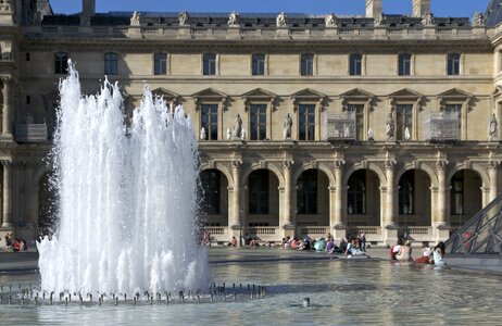 A fountain Louvre Palace, Paris, France photo