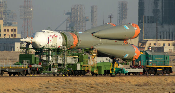 The Soyuz rocket is transported by train to the launch pad
