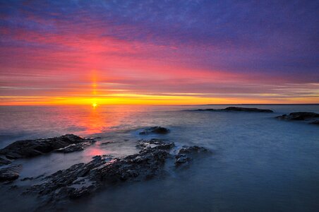 Sunrise over Lake Superior near Black Rocks Michigan photo