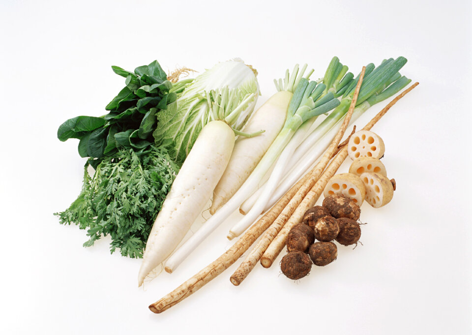 A group of fresh, root vegetables.