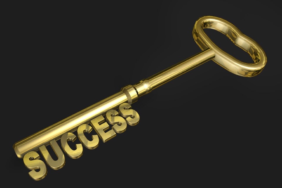 Gold Skeleton Key isolated on black background