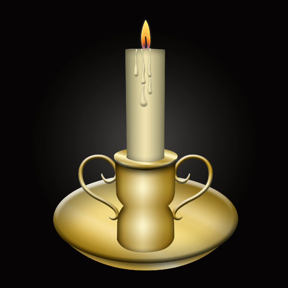 Candle on the old brass candlesticks