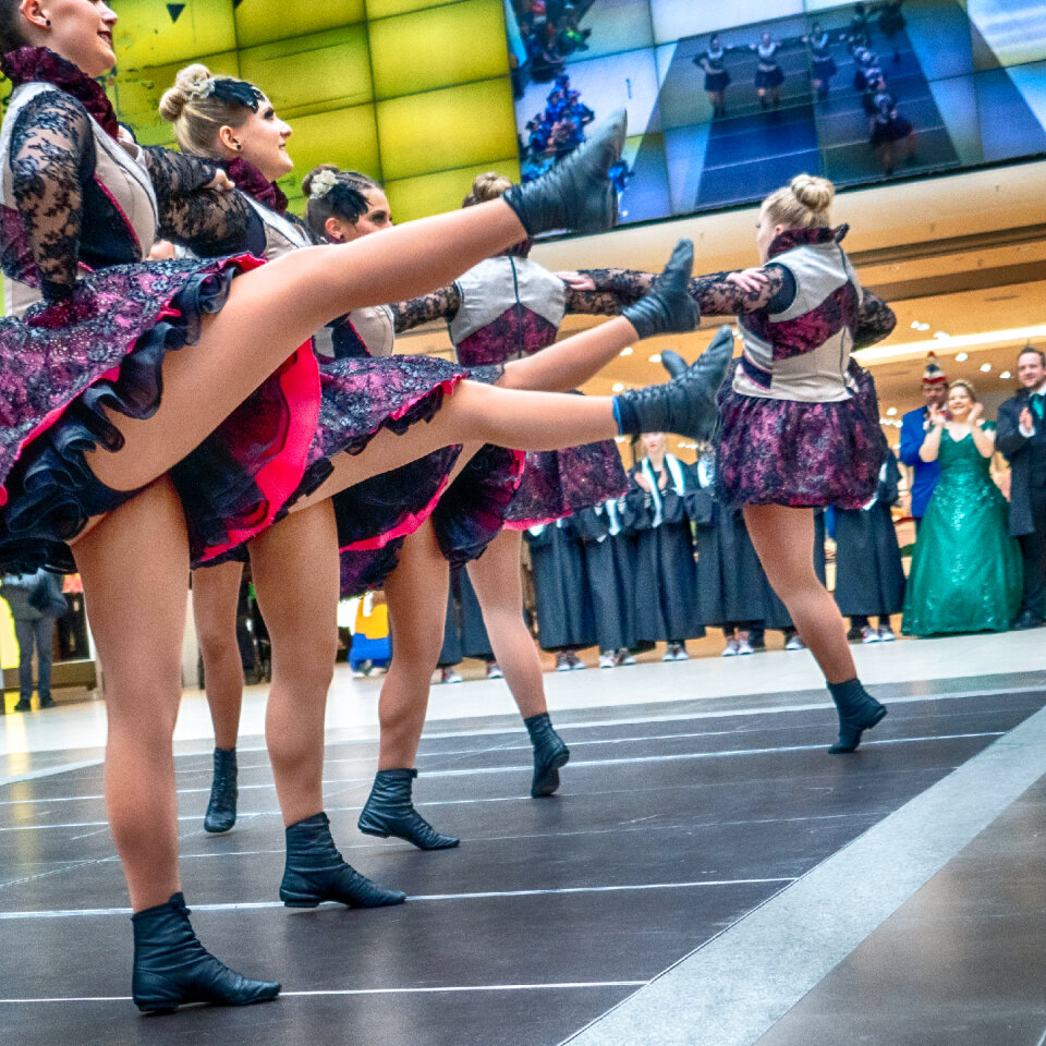 Cheerleader and dancer performing on stage