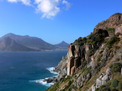 Rocky cliffs around entrance to Hout Bay Cape Town South Africa photo