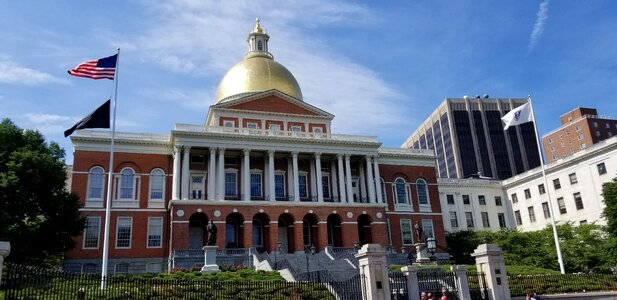 The Massachusetts State House under the blue sky