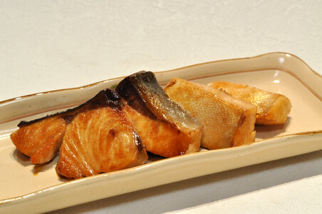 broiled teriyaki fish Japanese amberjack on plate photo