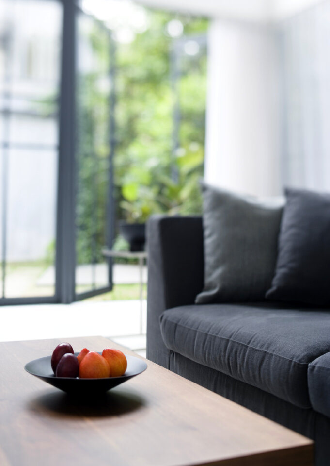 Fresh fruits on table in living room,close up
