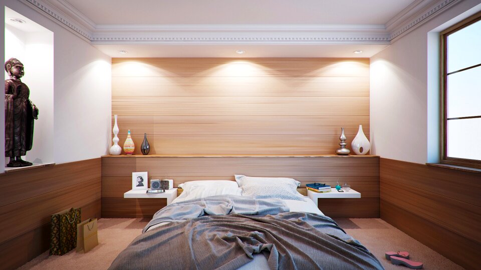 Image of spacious bedroom with modern stylish furniture