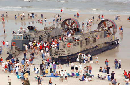 Spectators tour A Landing Craft Air Cushion