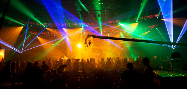 dj night club party rave with crowd in music festival