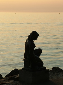Statue evening light twilight