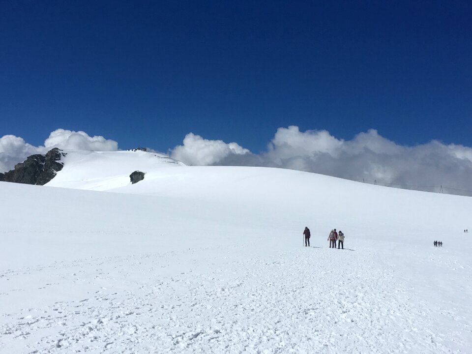 hikers team in the mountains. Matterhorn. Swiss Alps