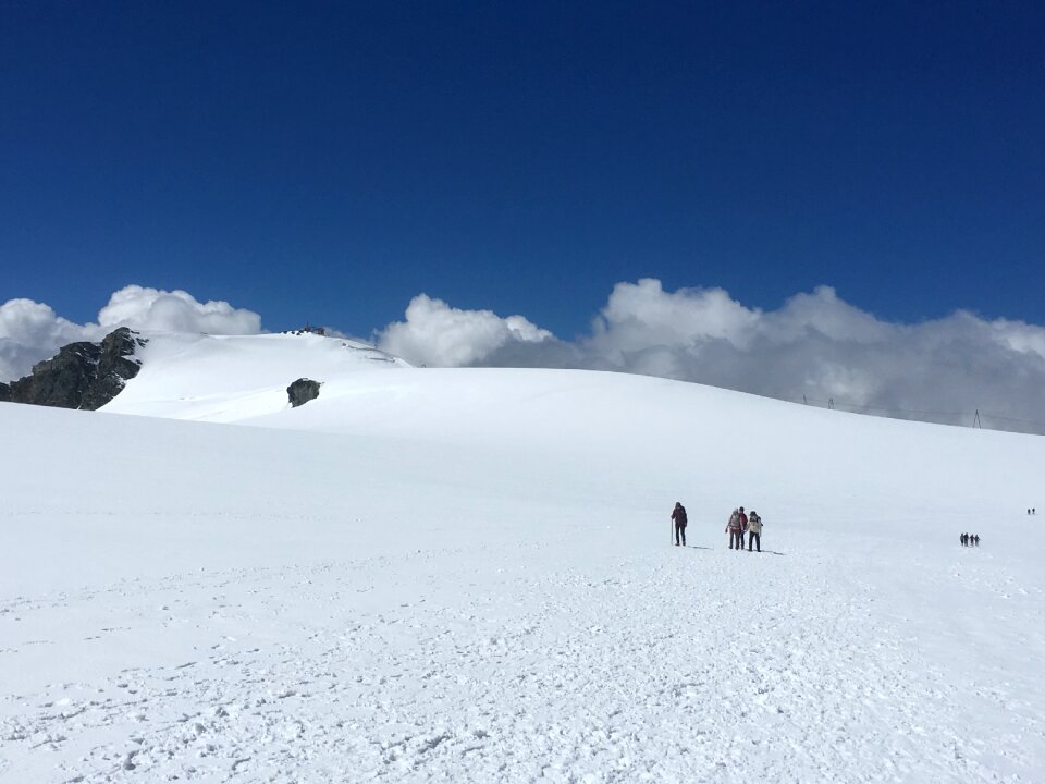 hikers team in the mountains. Matterhorn. Swiss Alps photo