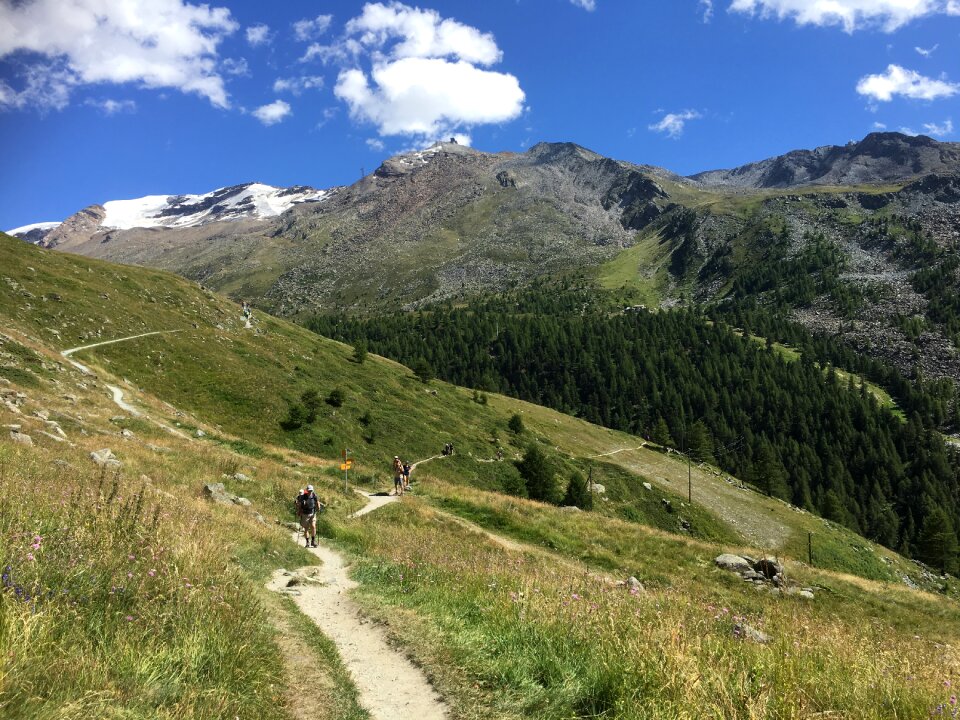 hikers team in the mountains. Matterhorn. Swiss Alps